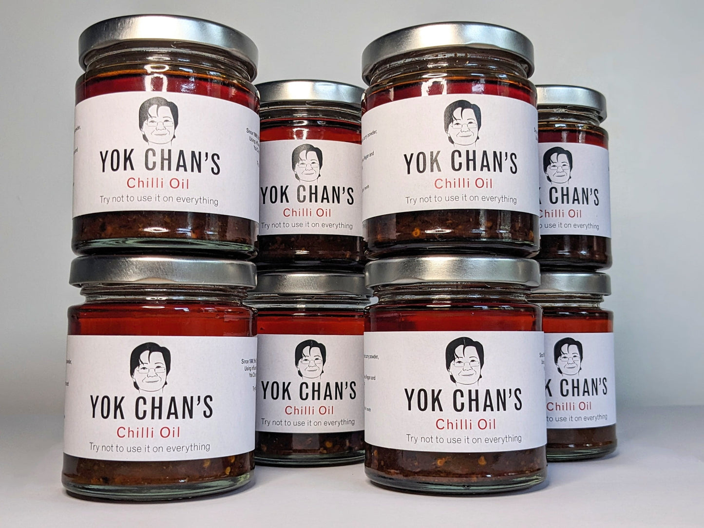 Eight jars of Yok Chan's Chilli Oil in pillars