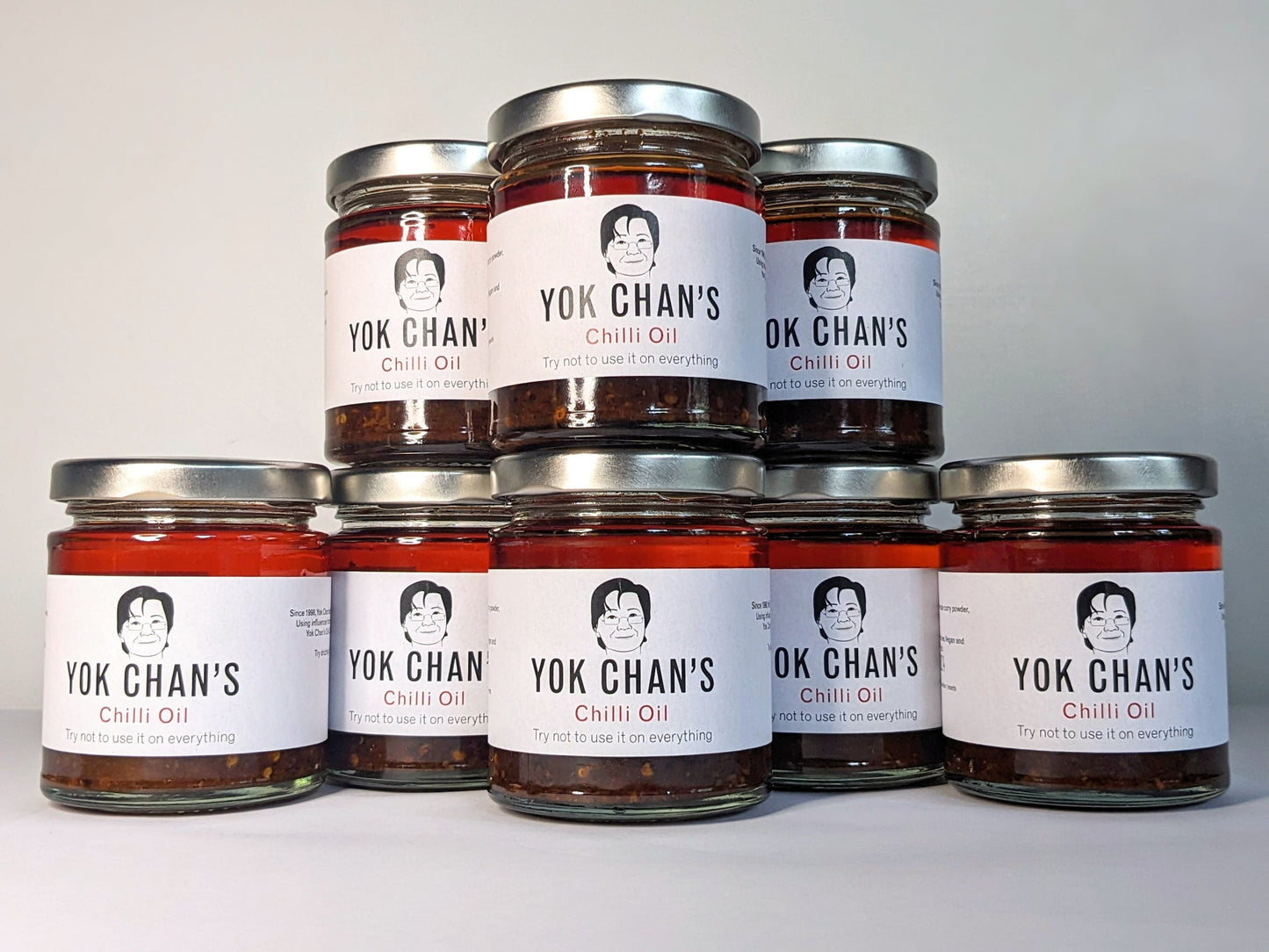 Eight jars of Yok Chan's Chilli Oil in a pyramid