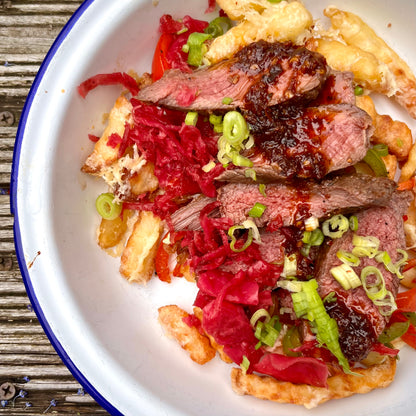 steak and chips with chilli oil and spring onion